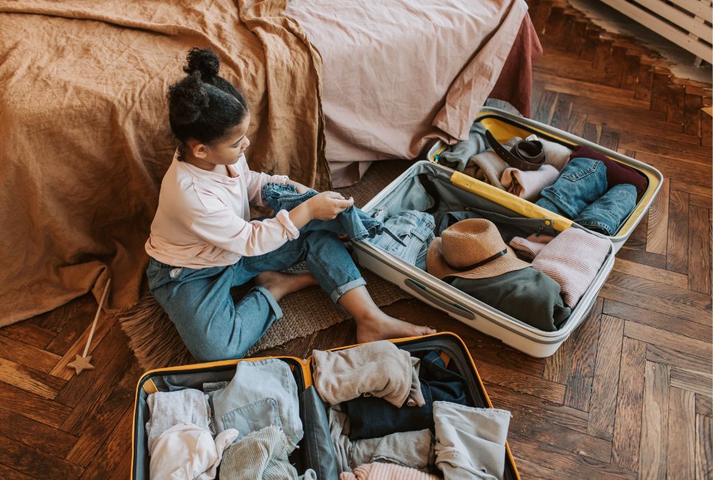 Student at Puran Murti packing for long weekends